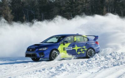 Perfecting the four-wheel drift in a Subaru STI on ice.